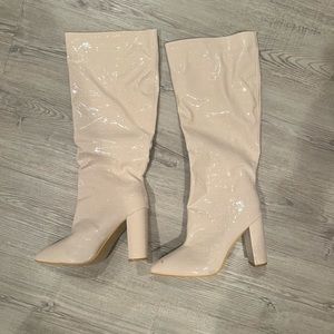 Knee High Heeled Boots.